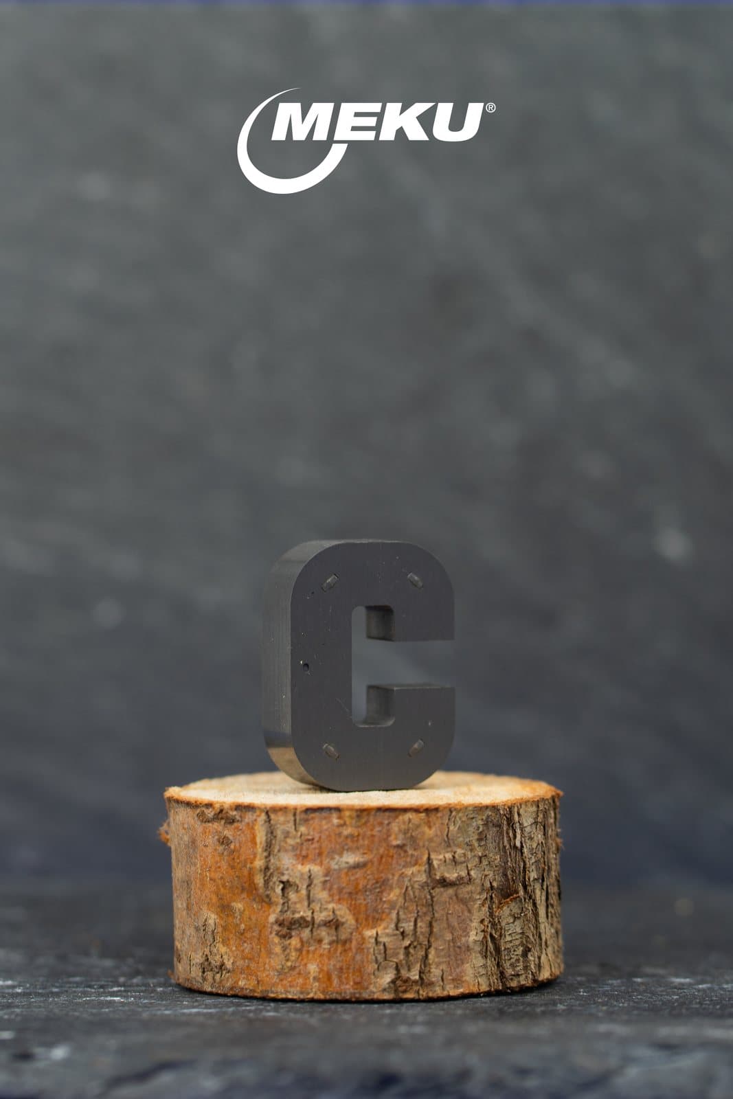 Precision stamped part by MEKU — new product photography